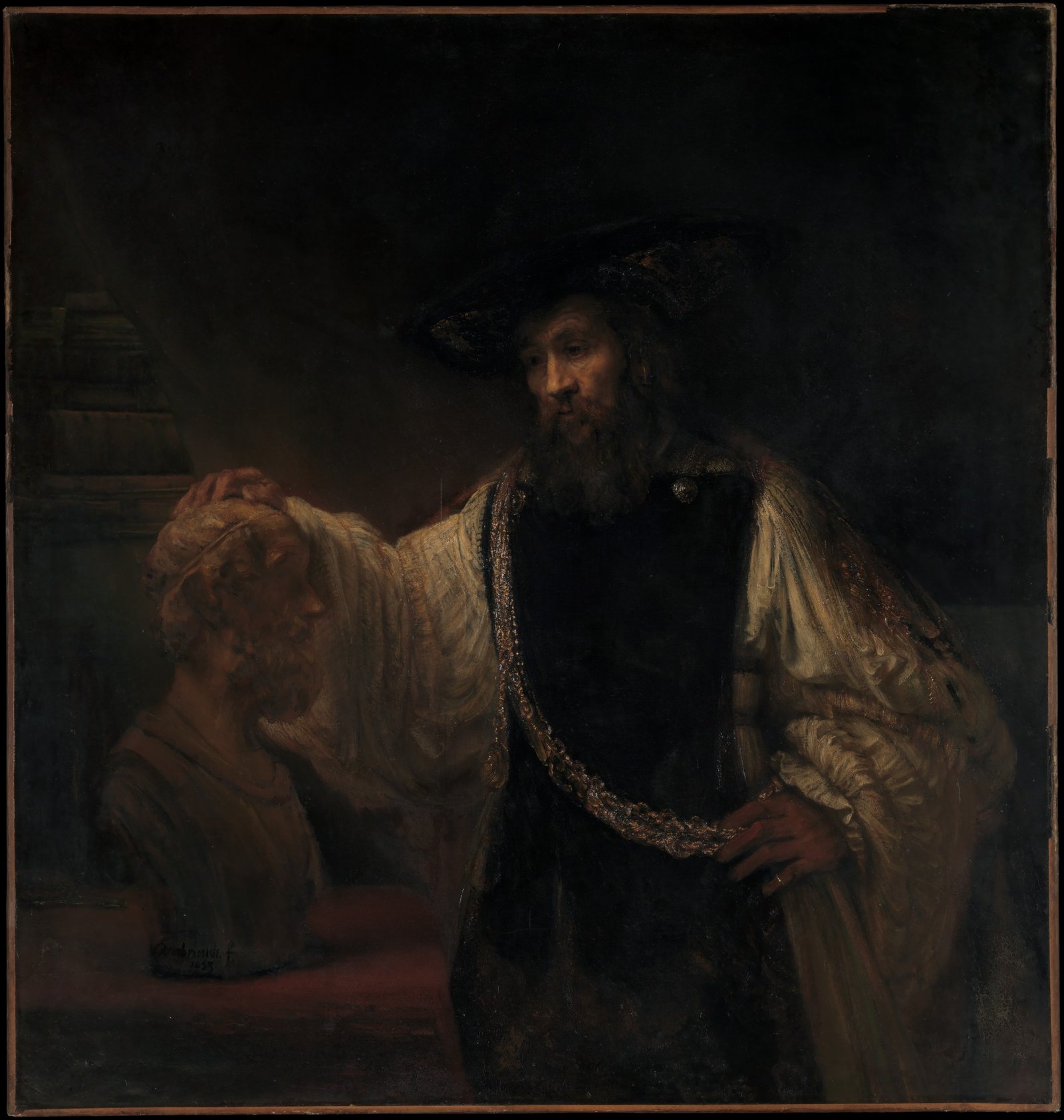 Rembrandt's painting of Aristotle in a gold chain resting a hand on a marble bust of Homer, lit against deep shadow.